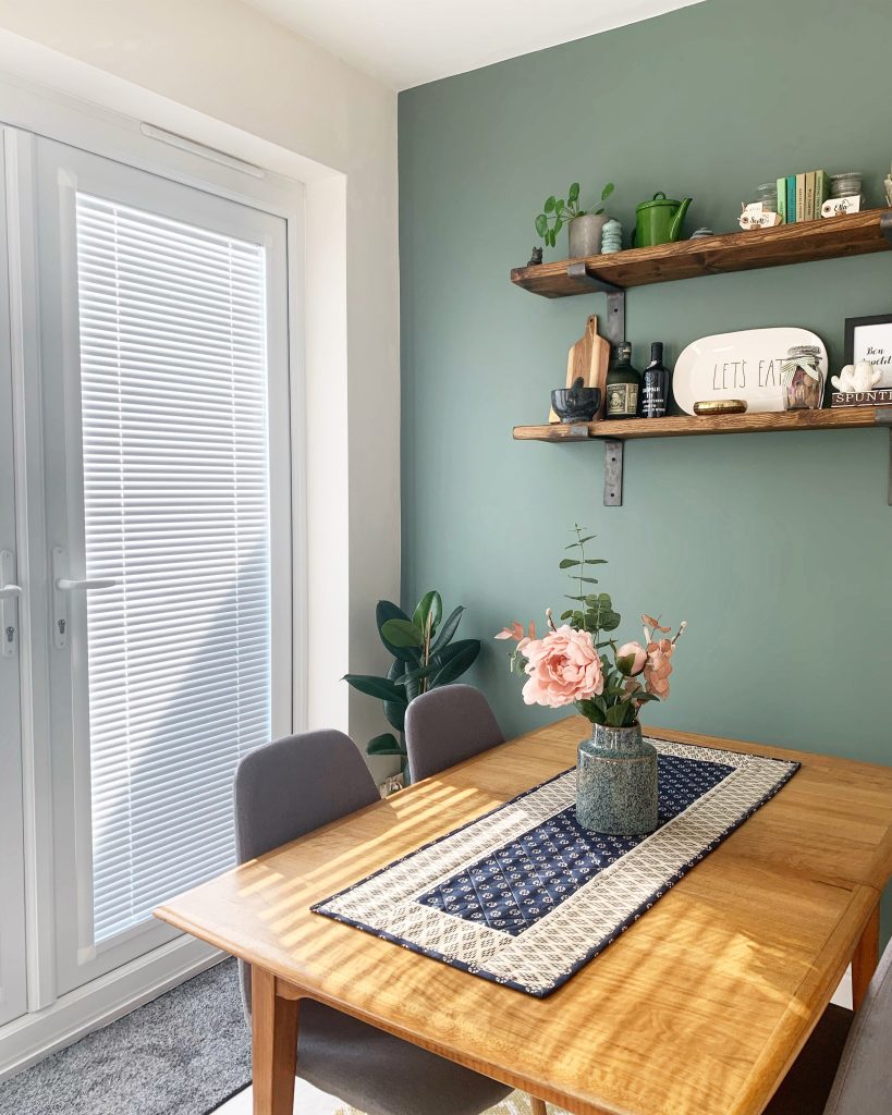 Grey Perfect Fit Venetian blind fitted within a glazed door frame